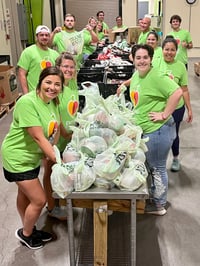 S-One volunteer at All Faiths Food Bank